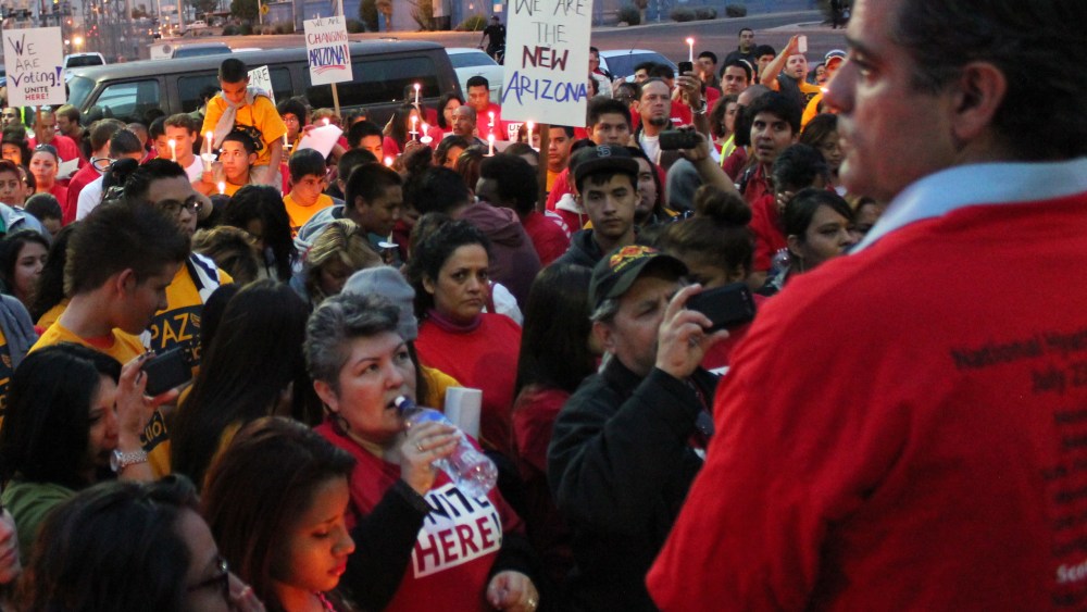 Supporters of the Adios Arpaio campaign hold a candlelight vigil outside the Maricopa County Recorder's office in Phoenix, Ariz. on November 15, 2012. (Photo courtesy of UNITE HERE.)