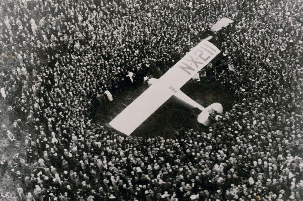 The Spirit of St. Louis is surrounded by a crowd after aviator Charles A. Lindbergh completed the first nonstop transatlantic flight at Le Bourget Airfield near Paris, France, May 21, 1927. (Photo via Xinhua/Corbis/Nat Geo/Christie's Images/ZUMA)