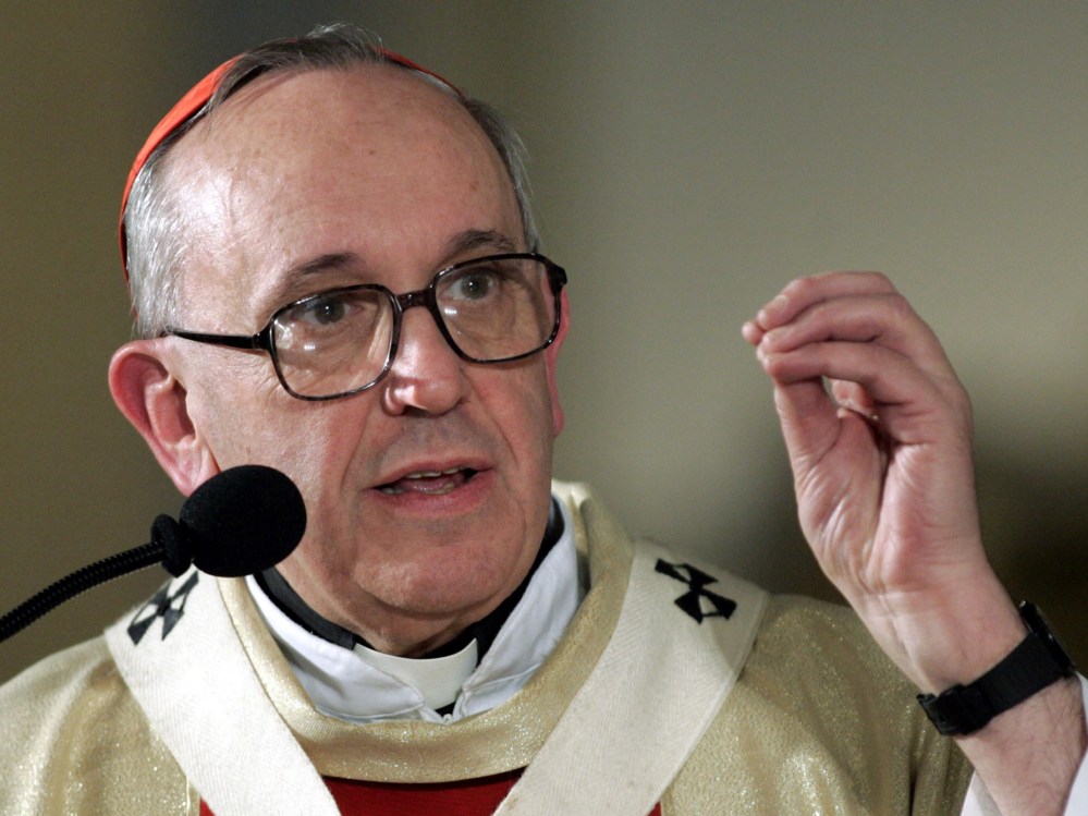 File PHoto: Argentine Cardinal Jorge Mario Bergoglio conducts a mass in honor of Pope John Paul II at the Buenos Aires cathedral in this April 4, 2005 file photograph. Bergoglio of Argentina was elected pope on March 13, 2013 to lead the Roman Catholic...
