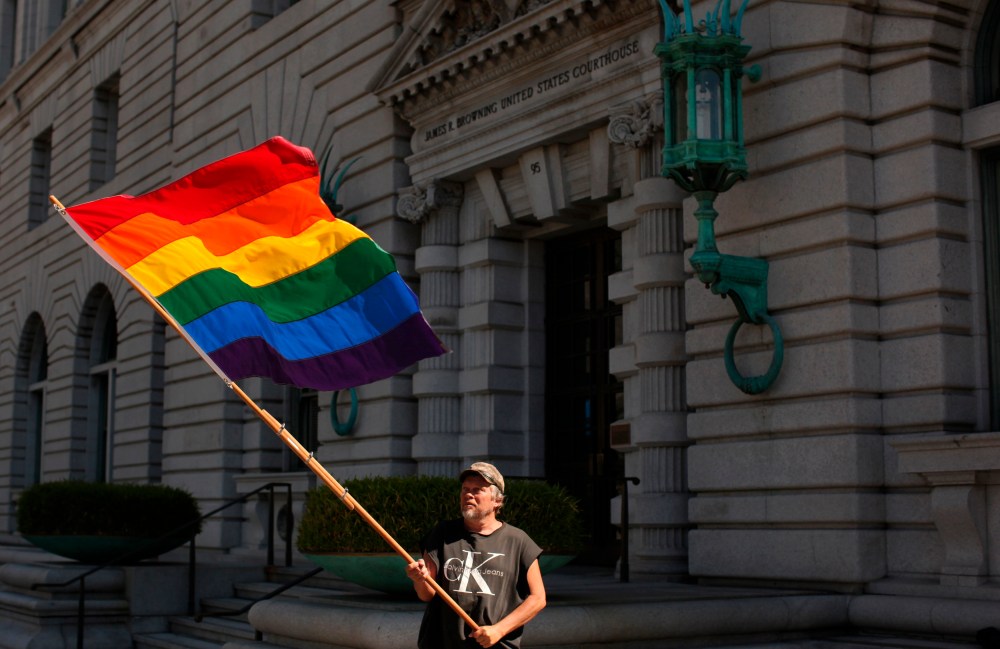 Bob Sodervick waves a rainbow flag outside the U.S. Courthouse in San Francisco, California in this June 5, 2012, file photo. (REUTERS/Robert Galbraith/Files)