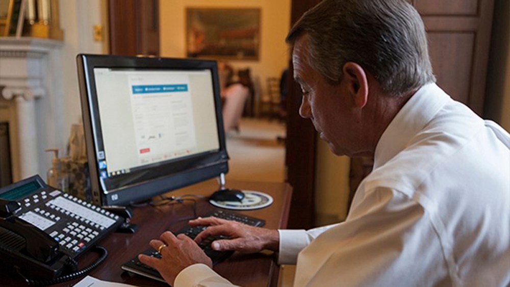 House Speaker John Boehner attempts to sign up for healthcare on the DC Health Link in Washington, November 21, 2013. Boehner said on his blog that he was successfully enrolled after help from the DC Health Link help line.