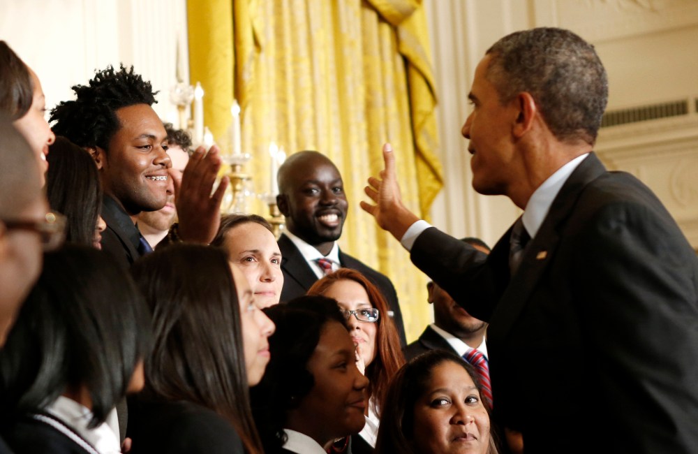 President Barack Obama shakes hands with Roger Brown, of Harlem, NY, during an event at the White House in Washington Jan. 9, 2014