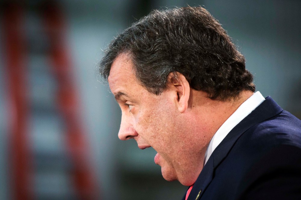 New Jersey Governor Chris Christie speaks to media and homeowners in Manahawkin, New Jersey January 16, 2014.