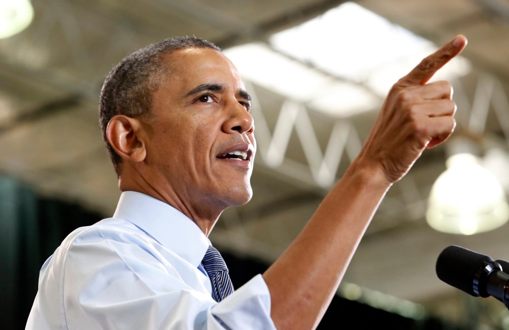 U.S. President Barack Obama delivers remarks on the economy at Costco Wholesale in Woodmore Towne Centre in Lanham, Maryland January 29, 2014.
