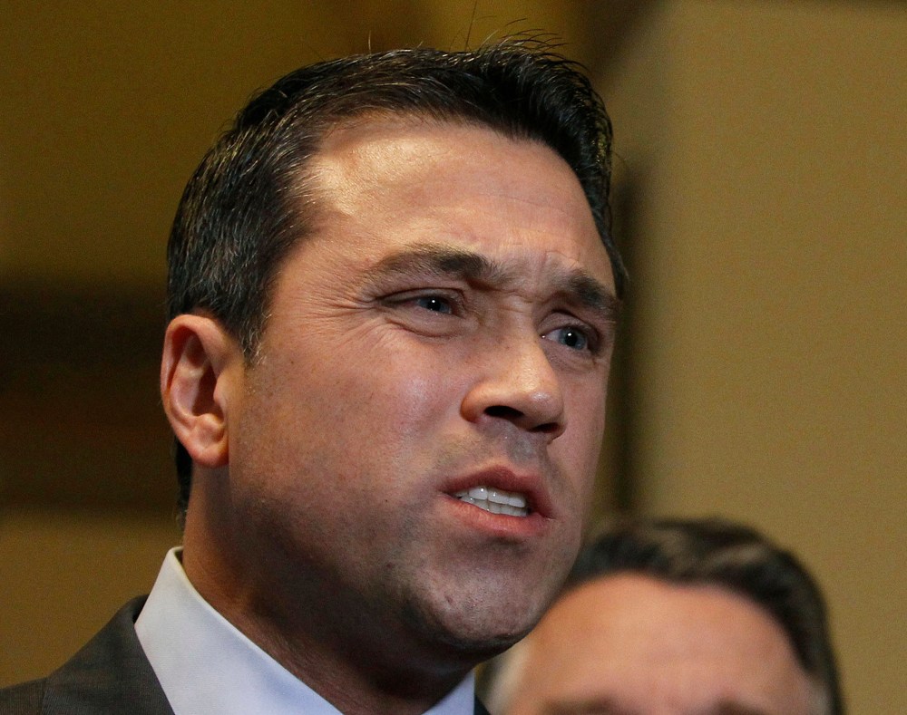 U.S. Representative Michael Grimm (R-NY) talks to the media after a meeting at the U. S. Capitol in Washington, in this January 2, 2013 file photo.
