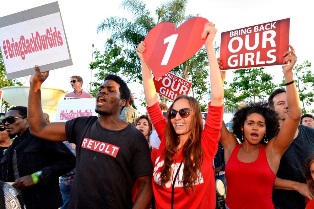 People participate in a "Bring Back Our Girls" campaign demonstration and candlelight vigil, held on Mother's Day in Los Angeles May 11, 2014.