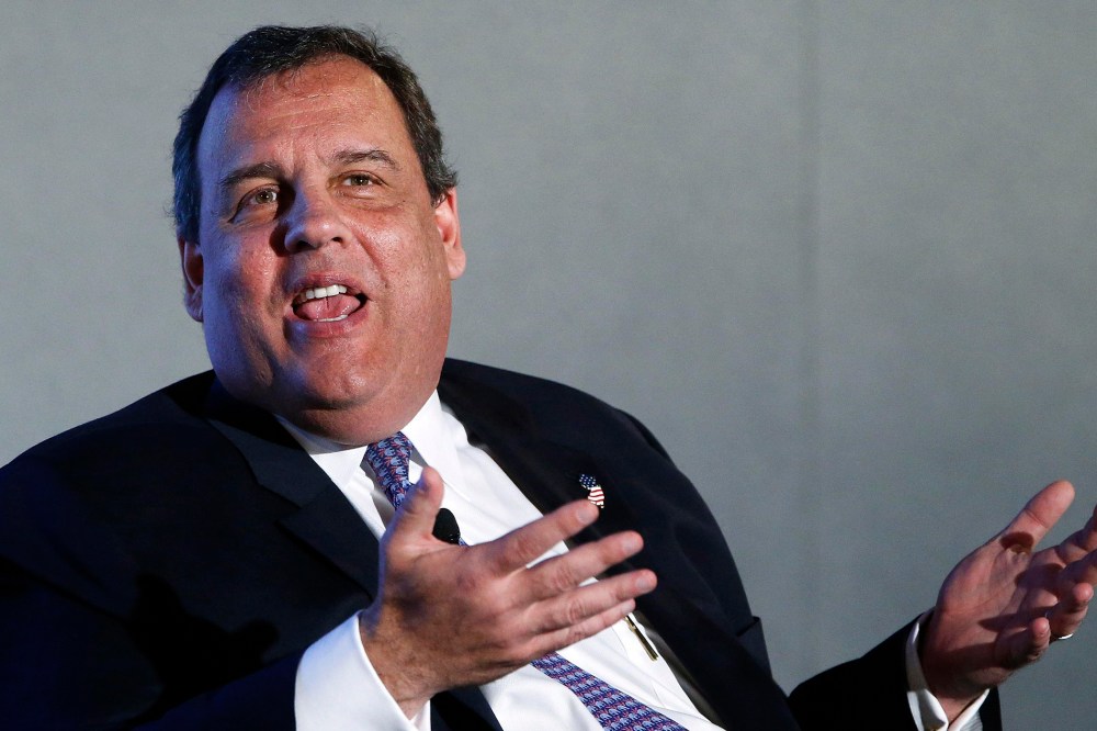 New Jersey Governor Chris Christie (R-NJ) gestures during an onstage interview at the 2014 Peterson Foundation Fiscal Summit in Washington on May 14, 2014.