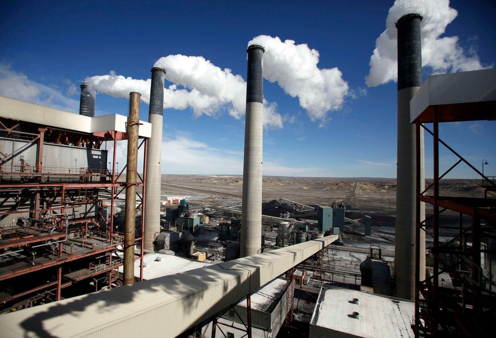 Steam rises from the stacks of the coal-fired Jim Bridger Power Plant outside Point of the Rocks, Wyoming in this file photo taken March 14, 2014.