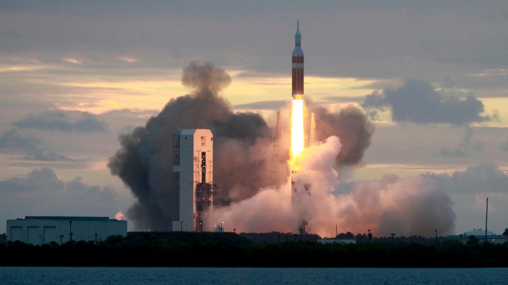 The Delta IV Heavy rocket with the Orion spacecraft lifts off from the Cape Canaveral Air Force Station in Cape Canaveral, Florida Dec. 5, 2014.
