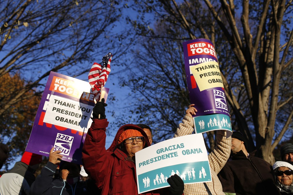 Hundreds of Immigrants and supporters gather outside of the White House after his speech about his immigration action, where nearly 5 millions of immigrants will be eligible for protection from deportation. (Photo by Oliver Contreras/Zuma)