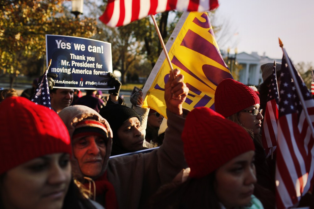 Hundreds of immigrants and supporters gather outside of the White House on Nov. 21, 2014 to thank President Barack Obama for his actions on immigration. (Photo by Oliver Contreras/Zuma)