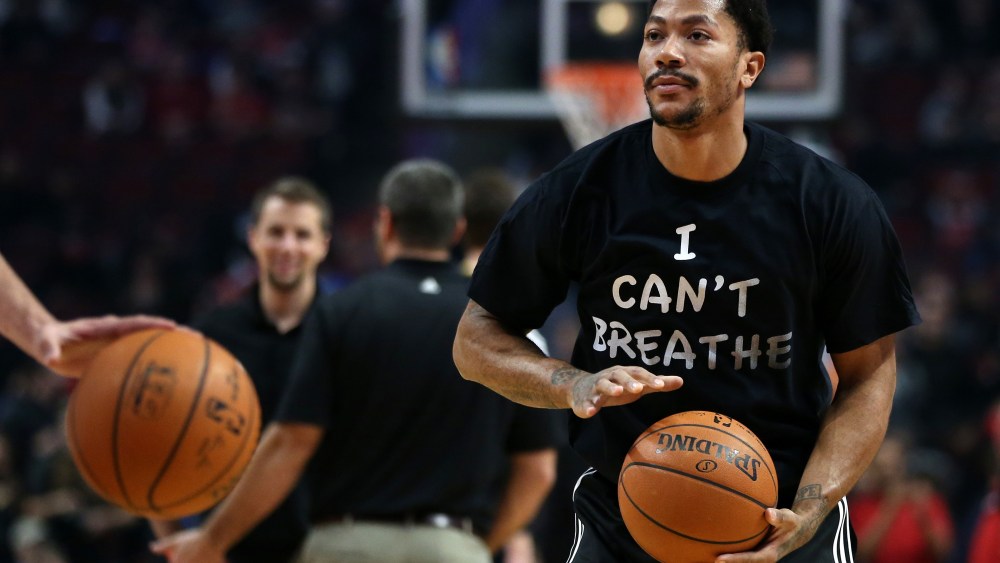 Chicago Bulls guard Derrick Rose wears a shirt reading ''I Can't Breathe'' while warming up for a game against the Golden State Warriors on Dec. 6, 2014 at the United Center in Chicago. (Chris Sweda/TNS/Zuma)