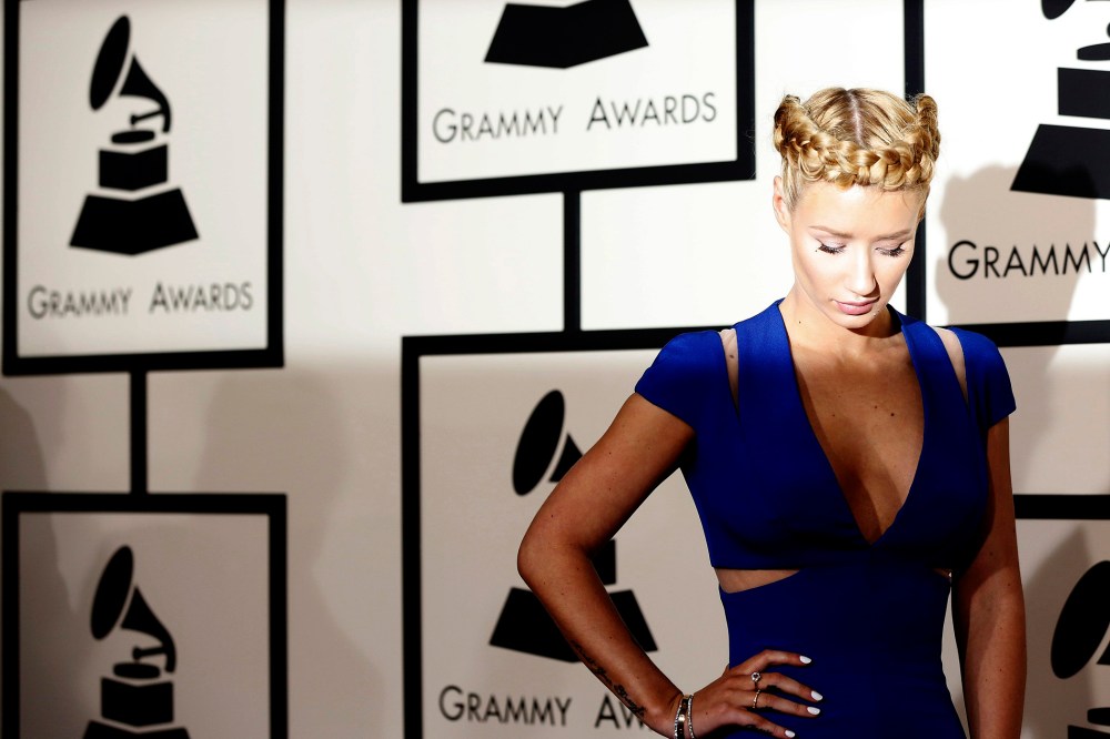 Rapper Iggy Azalea arrives at the 57th annual Grammy Awards in Los Angeles, Calif. on Feb. 8, 2015.