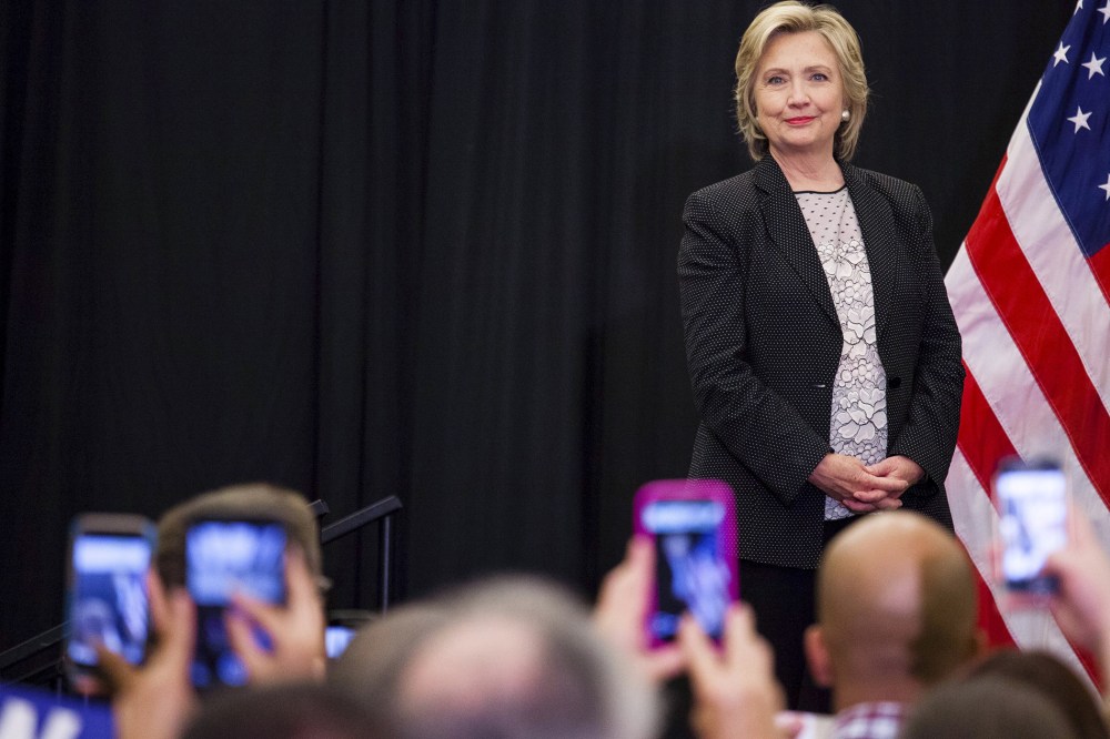Democratic presidential candidate Hillary Clinton looks into the crowd before she speaks at a "Women for Hillary" meeting in Milwaukee, Wis., Sept. 10, 2015. (Photo by Darren Hauck/Reuters)