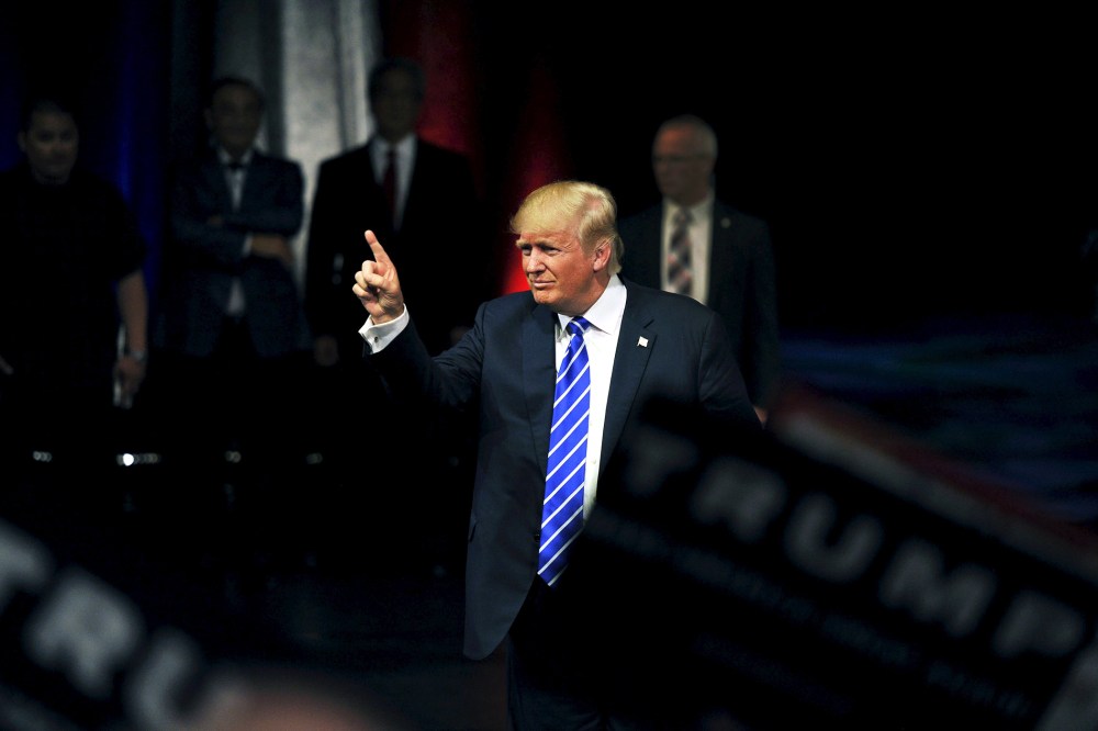 U.S. Republican Presidential candidate Donald Trump gestures as he greets the audience after speaking at a rally in Las Vegas, Nev., Oct. 8, 2015. (Photo by David Becker/Reuters)
