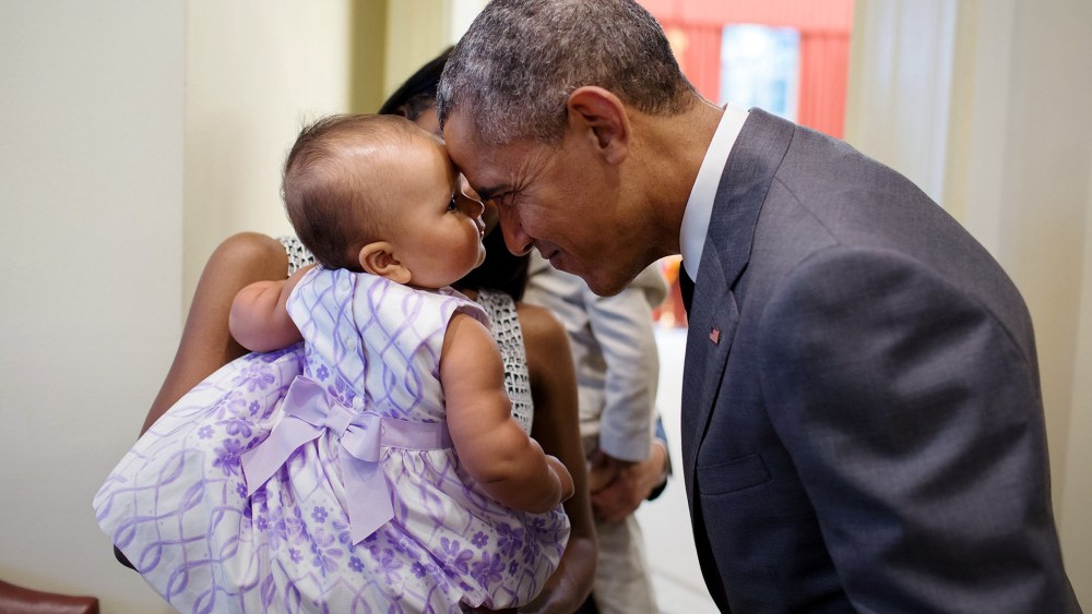 President Barack Obama greets nine-month-old Josephine Gronniger outside the Oval Office of the White House, July 17, 2015 in Washington, DC. (Photo by Pete Souza/Official White House Photo/Planet Pix/ZUMA)