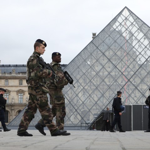 French military and police patrol the Louvre in Paris, France, which reopened Nov. 16, 2015. (Photo by Andrew Meares/Fairfax Media/ZUMA Press)