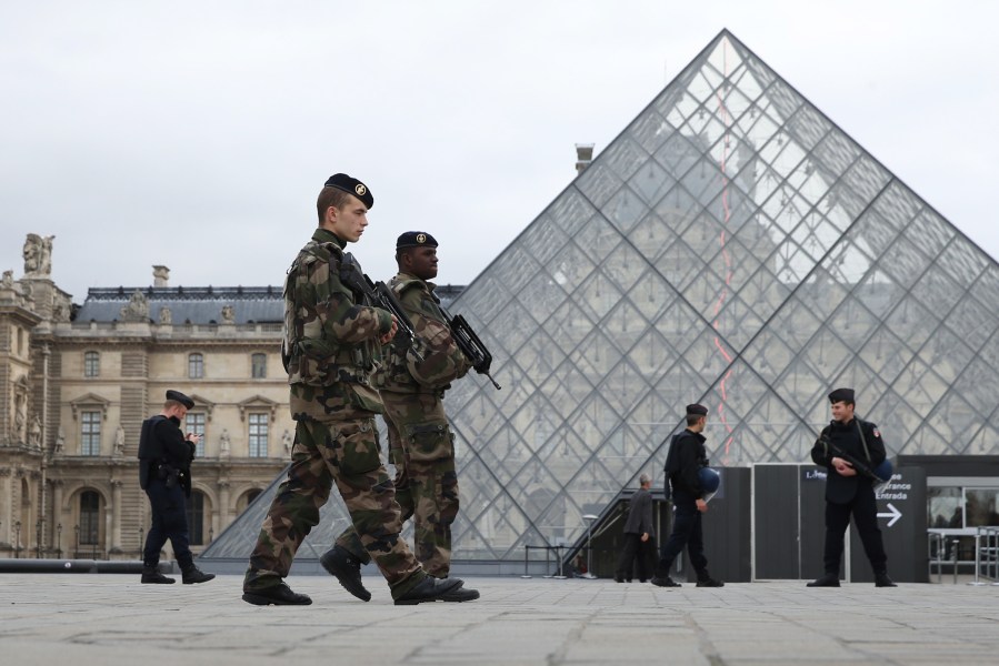 French military and police patrol the Louvre in Paris, France, which reopened Nov. 16, 2015. (Photo by Andrew Meares/Fairfax Media/ZUMA Press)