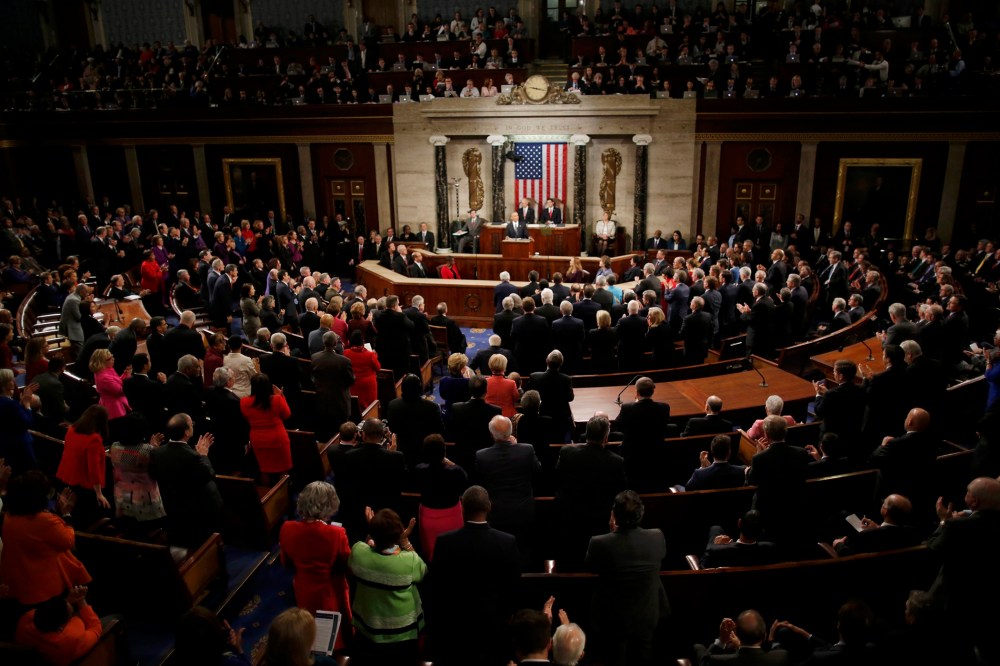 U.S. President Barack Obama is applauded as he delivers his State of the Union address to a joint session of Congress in Washington, Jan. 12, 2016. (Photo by Carlos Barria/Reuters)