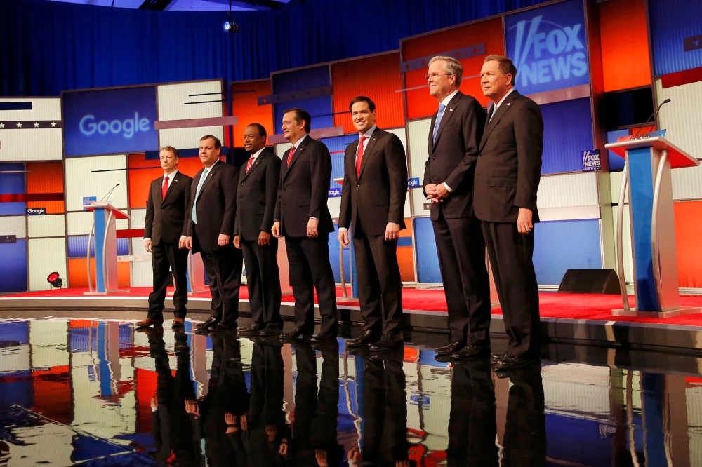 Republican U.S. presidential candidates pose together onstage at the debate held by Fox News in Des Moines, Iowa, Jan. 28, 2016. (Photo by Carlos Barria/Reuters)
