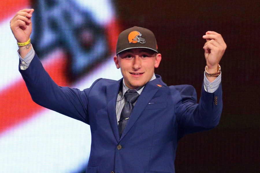 Johnny Manziel gestures after being selected by the Cleveland Browns in the first round of the 2014 NFL draft in New York, May 8, 2014. (Photo by Brad Penner/USA Today/Reuters)