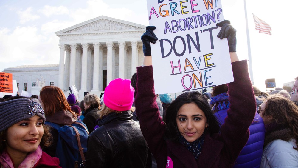Demonstrators assembled in front of the Supreme Court steps in Washington D.C. on March 2, 2016 as the Court heard oral arguments in the Whole Woman's Health v. Hellerstedt case. (Photo by Jeff Malet/Newscom/ZUMA)