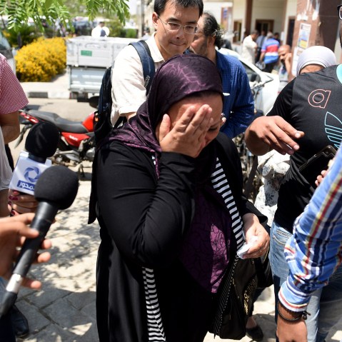 Media reporters surround relatives of those on the missing plane on May 19, 2016 in Cairo, Egypt. (Photo by Zhao Dingzhe/Xinhua/Zuma)