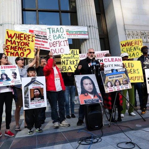 Coalition for Community Engagement members protest  reaction to Oakland Mayor Sheng Thao's absence since the FBI raided her home in Oakland, Calif., on June 23, 2024.