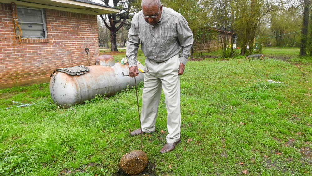 Lowndes County resident Jerome Means talks about his failing wastewater sanitation system at his home in Hayneville, Ala.