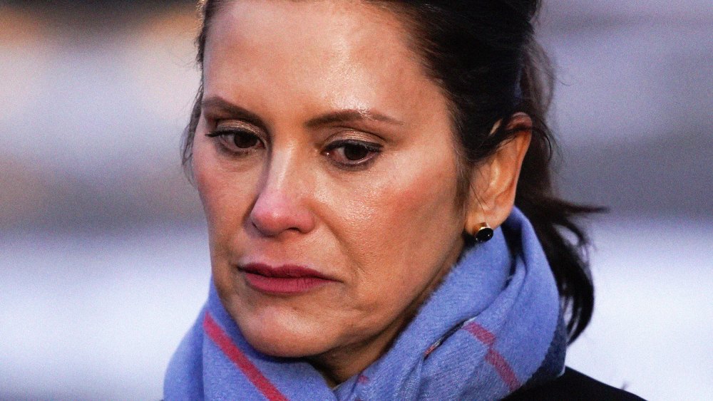 Gov. Gretchen Whitmer listens during a news conference in Oxford, Michigan on November 30.