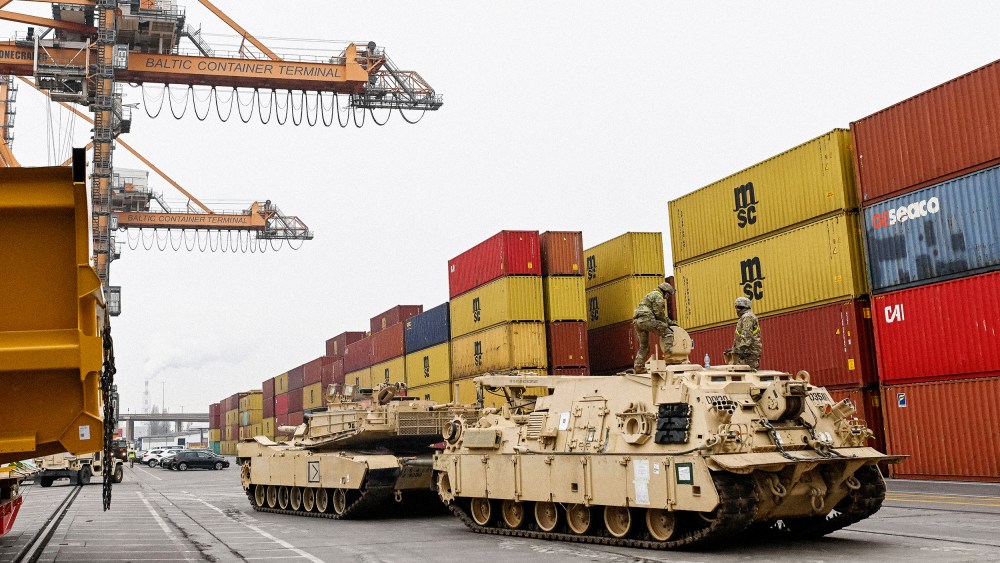 M1A2 Abrams battle tanks of the US army that will be used for military exercises by the 2nd Armored Brigade Combat Team, is unloaded at the Baltic Container Terminal in Gdynia on December 3, 2022.