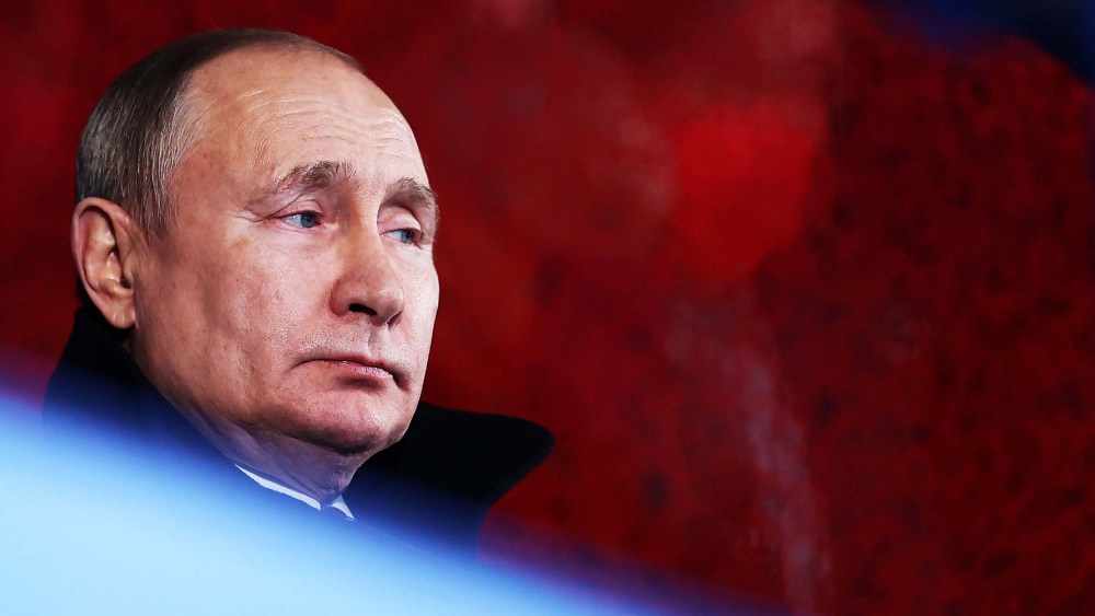 Vladimir Putin looks on during the Opening Ceremony of the Beijing 2022 Winter Olympics at the Beijing National Stadium on February 4.