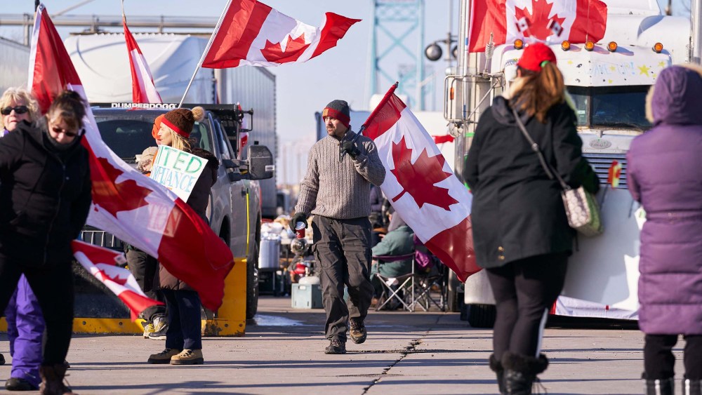 Protestors against Covid-19 vaccine mandates block the roadway at the Ambassador Bridge border crossing in Windsor, Ontario, Canada, on February 9.