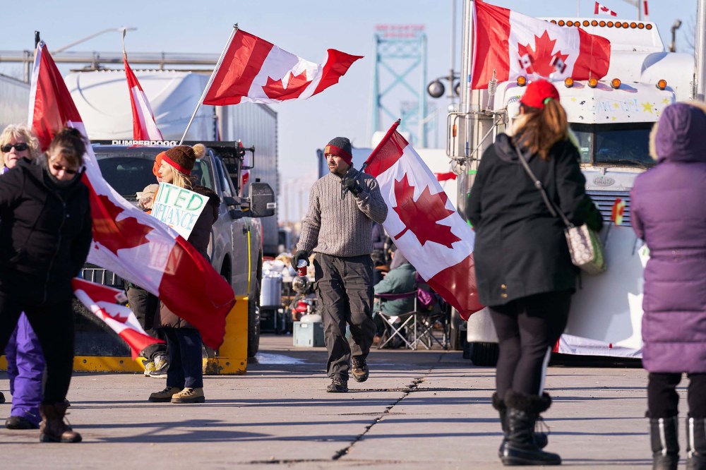 Protestors against Covid-19 vaccine mandates block the roadway at the Ambassador Bridge border crossing in Windsor, Ontario, Canada, on February 9.