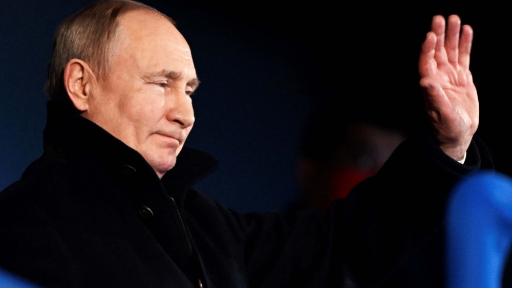 Russia's President Vladimir Putin gestures during the opening ceremony of the Beijing 2022 Winter Olympic Games at the National Stadium on February 4, 2022.