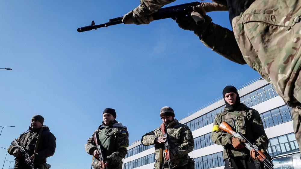 Image: New members of the Ukrainian Territorial Defense Forces train with weapons in Kyiv on Feb. 28, 2022.