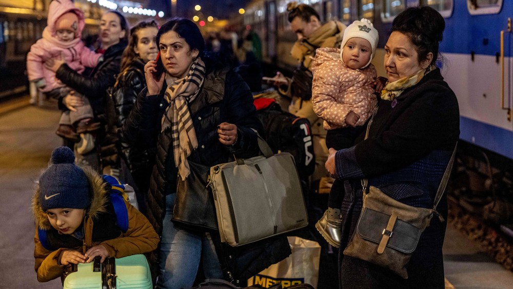 Ukrainians Flee To Hungary Amid Russia's Armed Invasion