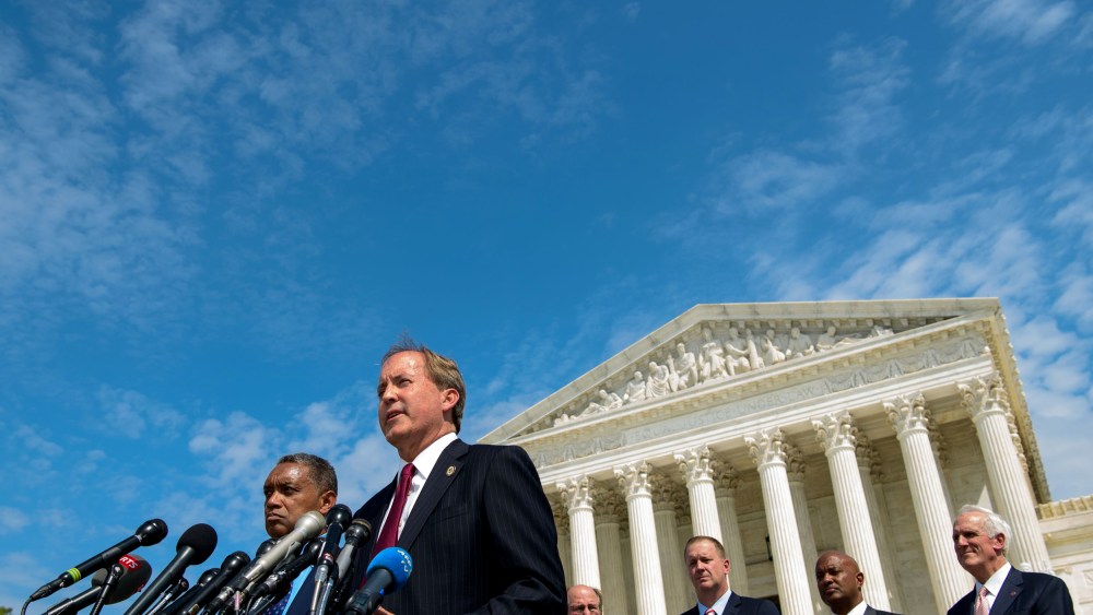 Image: Texas Attorney General Ken Paxton outside of the Supreme Court in 2019.