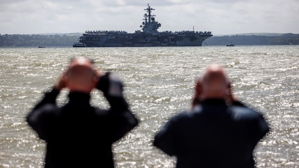 Image: The USS George H.W. Bush aircraft carrier off the coast of Portsmouth, England, in 2017.