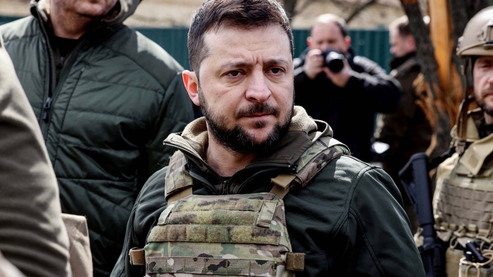 Ukainian President Volodymyr Zelensky stands in the town of Bucha, northwest of the Ukrainian capital Kyiv on April 4.