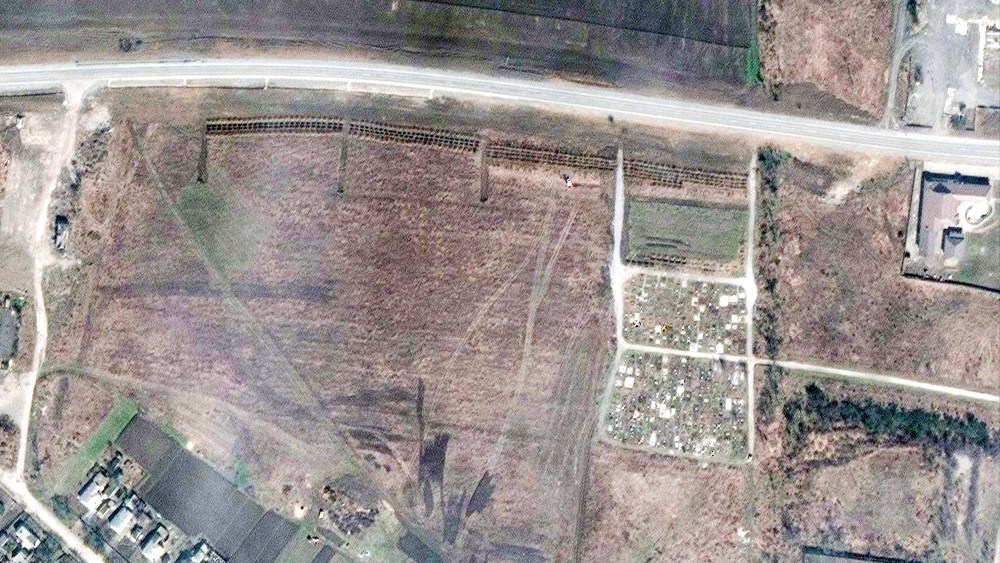 Maxar satellite imagery of the expansion of the mass grave site on the northwestern edge of Manhush, Ukraine, 12 miles north of Mariupol.