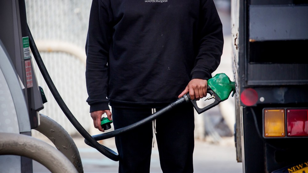 A person pumps gas at a gas station in Brooklyn, NY on March 8. The U.S. national average for a gallon of regular gasoline hit a fresh record high of 4.173 dollars on Tuesday, according to data from the American Automobile Association.