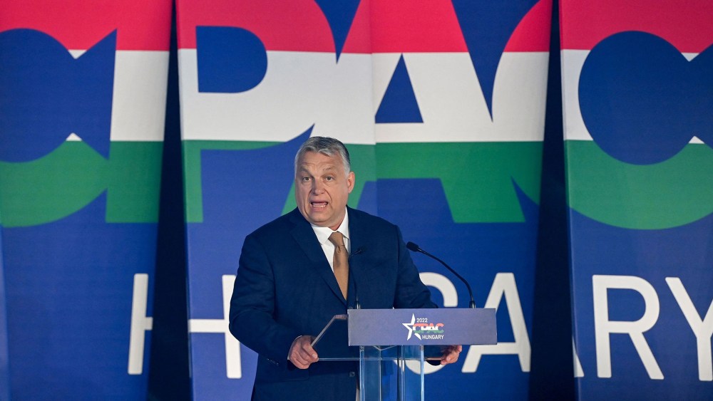 Image: Viktor Orban giving a speech against a background that reads, "CPAC Hungary"