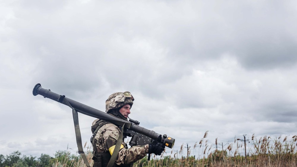 A Ukrainian soldier is seen with an anti-aircraft weapon in Donetsk Oblast, Ukraine