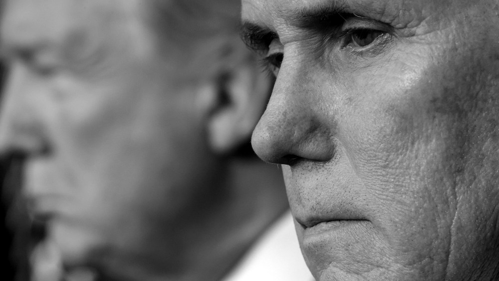 Image: A close-up shot of Mike Pence with Donald Trump in the background.