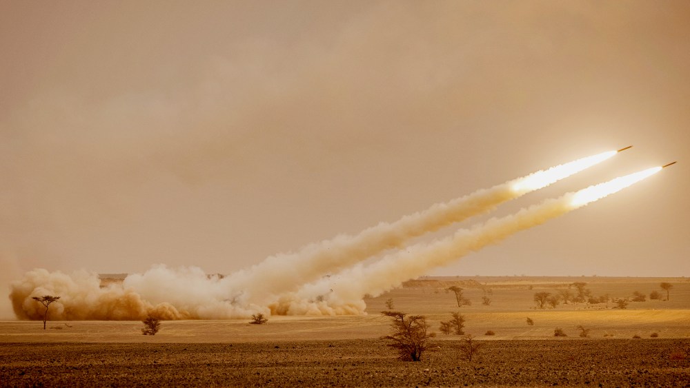 US M142 High Mobility Artillery Rocket System (HIMARS) launchers fire salvoes during the "African Lion" military exercise in southeastern Morocco