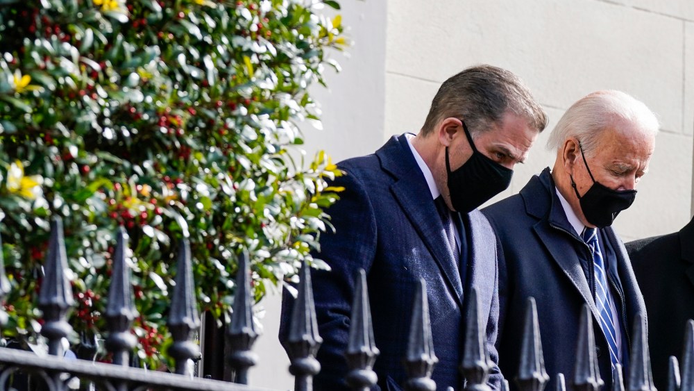 President Joe Biden and his son Hunter depart after attending Mass at Holy Trinity Catholic Church on Jan. 24, 2021, in the Georgetown neighborhood of Washington.