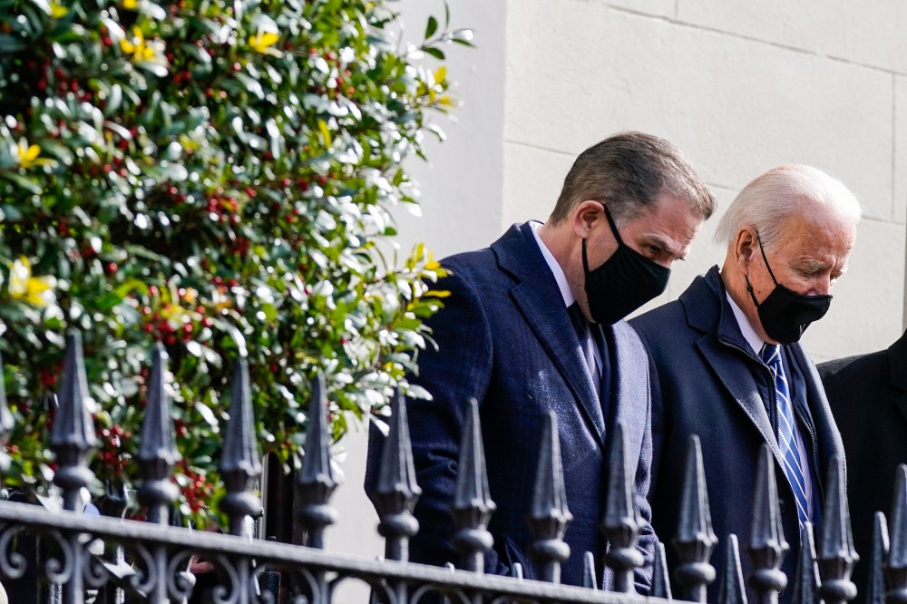 President Joe Biden and his son Hunter depart after attending Mass at Holy Trinity Catholic Church on Jan. 24, 2021, in the Georgetown neighborhood of Washington.