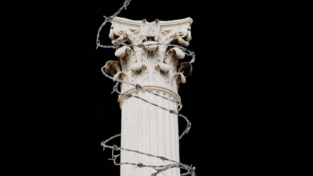 Photo Illustration: A Supreme Court pillar wrapped in barbed wire