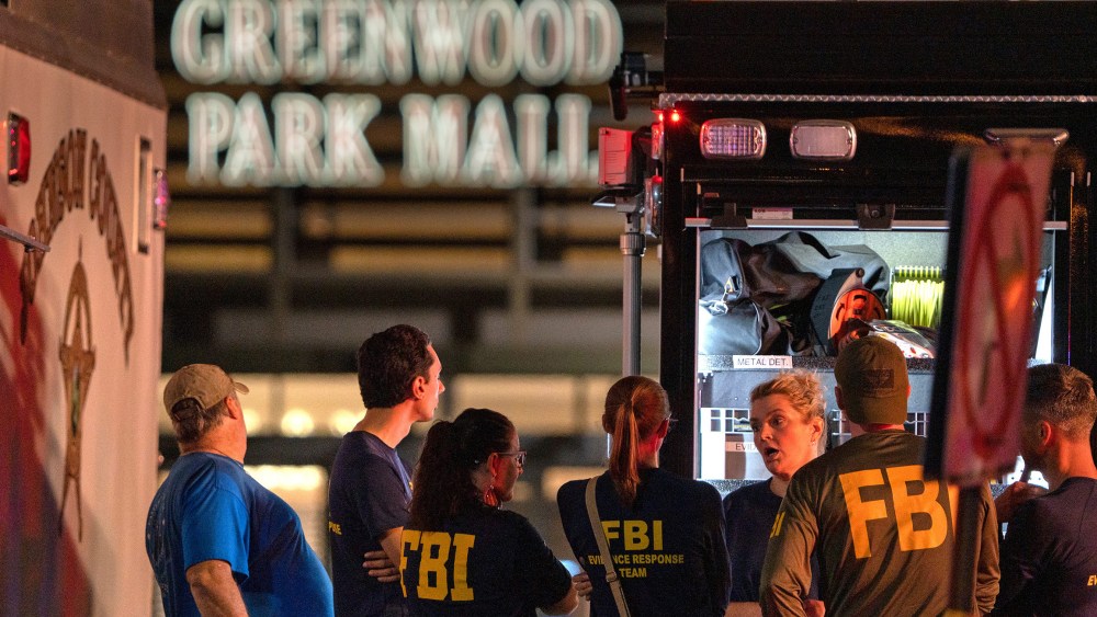 Image: FBI agents gathered outside the Greenwood Park Mall.